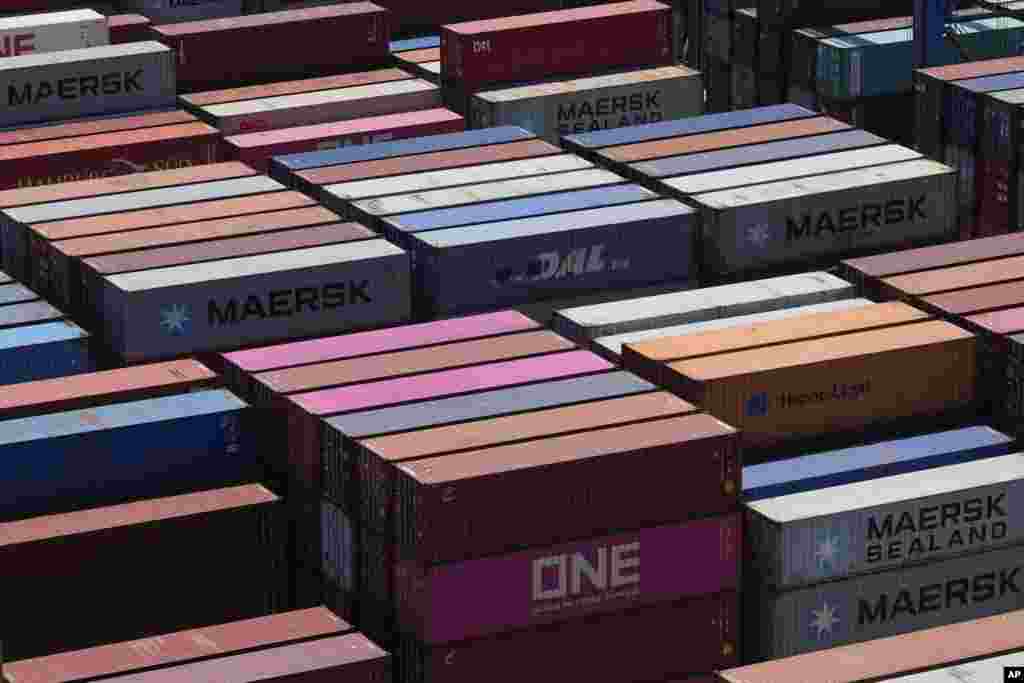 Containers are stacked at the Manzanillo International Terminal port in Manzanillo Bay, Panama. (AP Photo/Arnulfo Franco)