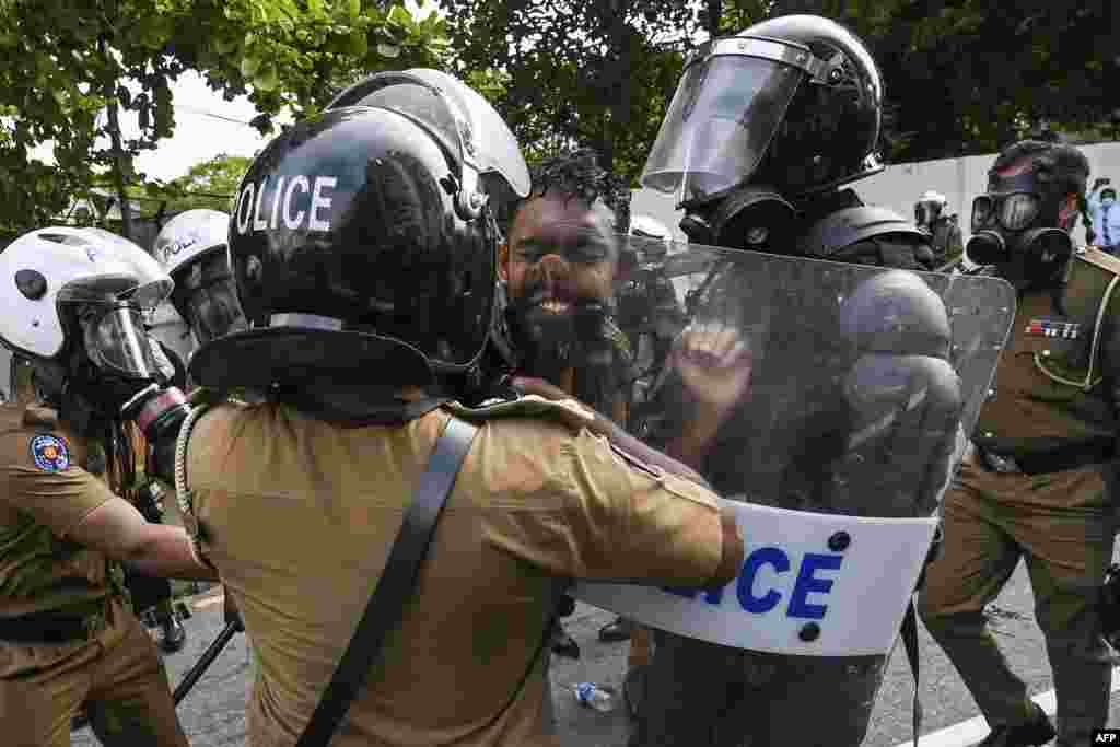 University students clash with police during a demonstration in Colombo, Sri Lanka.