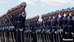 FILE - A Taiwan honor guard gets ready before a welcome ceremony for the king of what was then called Swaziland, Mswati III, at the Chiang Kai-shek Memorial in Taipei, July 29, 2010.