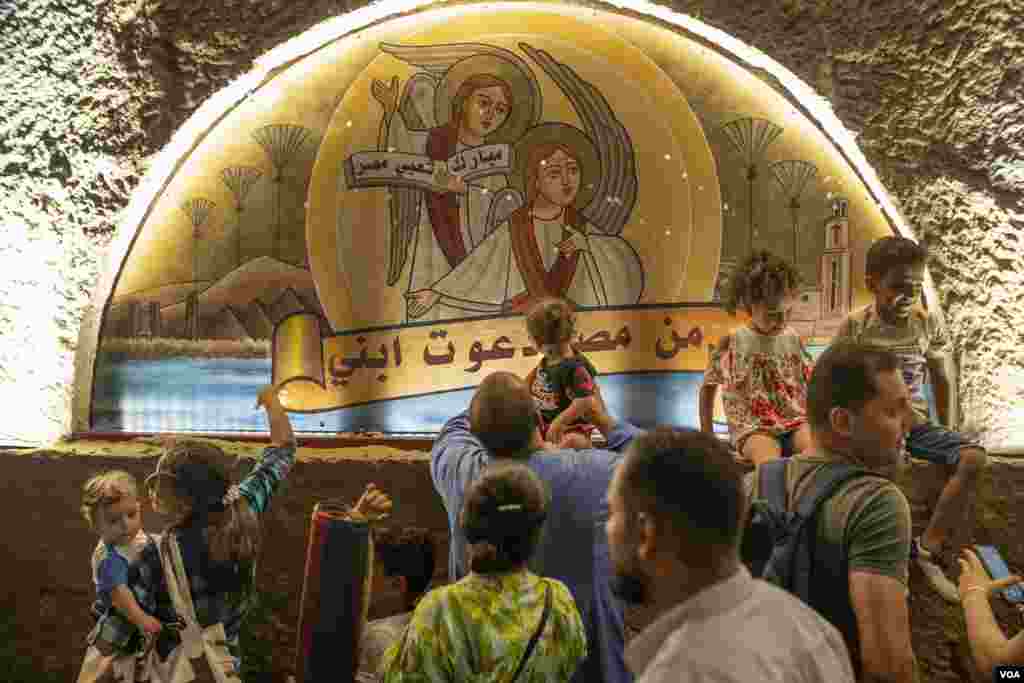 Each August in the sweltering desert heat, worshippers visit the Virgin Mary Monastery, an ancient mountain cave along the River Nile, where they believe the Holy Family found refuge from persecution. On August 20, 2022. (Hamada Elrasam/VOA)