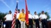 Navajo Code Talker Thomas Begay, third from left, stands with the Ira H. Hayes American Legion Post 84 Honor Guard prior to the Arizona State Navajo Code Talkers Day ceremony, in Phoenix, Aug. 14, 2022. 