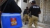 Gunmen Kill 2 Policemen Escorting Polio Workers in Pakistan 
