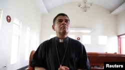 Rolando Alvarez prays at a Catholic church where he is taking refuge alleging he had been targeted by the police, in Managua, Nicaragua. (File)