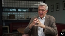 United Nations High Commissioner for Refugees Filippo Grandi speaks to The Associated Press at UNHCR headquarters in Geneva, Aug. 17, 2022.