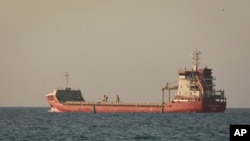 Cargo ship 'Rahmi Yagci' makes its way from the port in Odesa, Ukraine, Aug. 9, 2022.