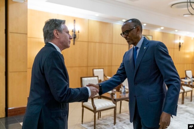 FILE - Secretary of State Antony Blinken, left, meets with Rwandan President Paul Kagame at the President's Office in Urugwiro Village in Kigali, Rwanda, Aug. 11, 2022.