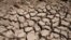 FILE - Cracked dry mud illustrates the climate-change induced drought that has hit northeast Africa for the fifth year in a row. Taken 8.20.2022