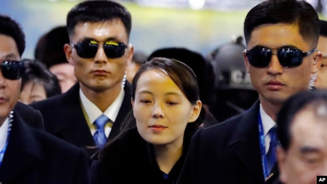 FILE - In this Feb. 9, 2018, photo, North Korean leader Kim Jong Un's younger sister Kim Yo Jong, center, arrives at the Jinbu train station in Pyeongchang, South Korea.