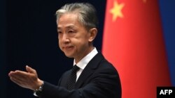 "Toute tentative de s'opposer par la force armée (...) à la réunification" est "vouée à l'échec", a adéclaré Wang Wenbin, porte-parole du ministère chinois des Affaires étrangères.