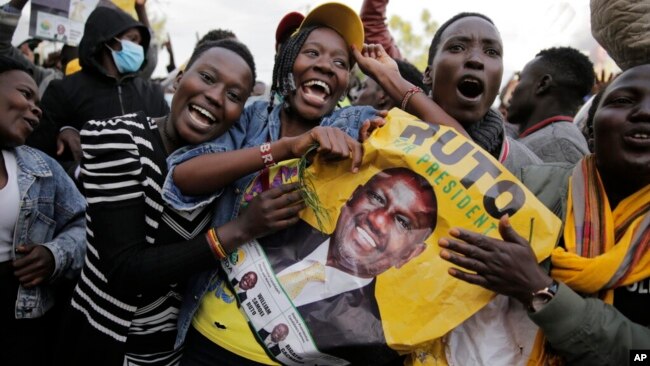 Supporters of Deputy President and presidential candidate William Ruto celebrate his victory over opposition leader Raila Odinga in Eldoret, Kenya, Aug. 15, 2022. (AP Photo/Brian Inganga)