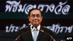 FILE - In this photo taken on Aug. 17, 2022, Thailand's Prime Minister Prayut Chan-O-Cha addresses an award function in Bangkok. On Aug. 24, 2022, Thailand's Constitutional Court suspended Prayut while it hears a case that could see him kicked out of office. 