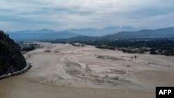 Banjir di Mingora, sebuah kota di Lembah Swat utara Pakistan menyusul hujan lebat pada 27 Agustus 2022. (Foto: AFP)