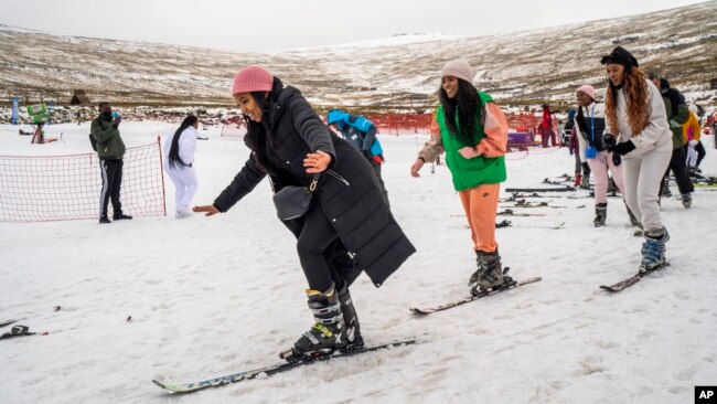 First time skiers take a lesson at the Afriski ski resort near Butha-Buthe, Lesotho, Saturday July 30, 2022.  (AP Photo/Jerome Delay)