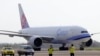 FILE - In this photo released by the Taiwan Centers for Disease Control, a China Airlines cargo plane carrying COVID-19 vaccines from Memphis arrives at the airport outside Taipei, June 20, 2021.