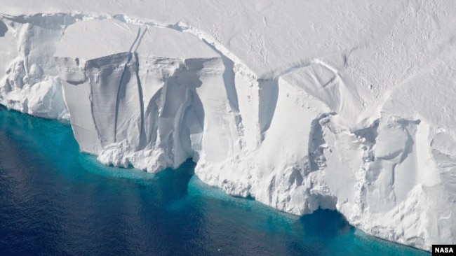 The 200-foot-tall (60-meter-tall) front of the Getz Ice Shelf in Antarctica is scored with cracks where icebergs are likely to break off, or calve, in this 2016 photo. (Credit: NASA/GSFC/OIB)