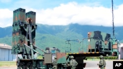 Taiwanese soldiers operate a Sky Bow III (Tien-Kung III) surface-to-air missile system at a base in Taiwan's southeastern Hualien county on Aug. 18, 2022.