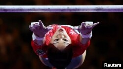 Germany&#39;s Kim Bui competes during the women&#39;s uneven bars final artistic gymnastics event of the European Championships in Munich, Germany.