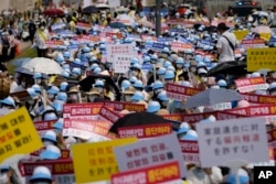Aksi protes Pengikut Gereja Unifikasi di pusat kota Seoul, Korea Selatan, Kamis, 18 Agustus 2022. (AP/Lee Jin-man)