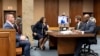 FILE - Fulton County prosecutor Fani Willis, center, and her team are pictured during proceedings to seat a special purpose grand jury in Fulton County, Ga., May 2, 2022, to look into the actions of former President Donald Trump and his supporters.