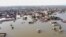 FILE - This aerial view shows a flooded residential area after heavy monsoon rains in Balochistan province of Pakistan, Aug. 29, 2022. 