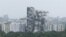 The Supertech Twin Towers collapses following a controlled demolition after the Supreme Court found them in violation of building norms, in Noida, India, Aug. 28, 2022. 