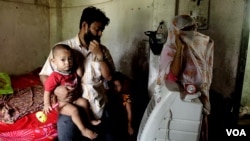 With his family, Mohammad Selim, a Rohingya Muslim refugee, is hiding in a village in eastern India, May 2019, after fleeing a police crackdown in a Rohingya refugee colony in north India. Recently the Rohingya man was arrested and sent to jail by Indian 