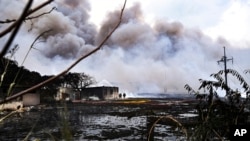 Smoke continues to billow from a deadly fire at a large oil storage facility in Matanzas, Cuba, Aug. 9, 2022.