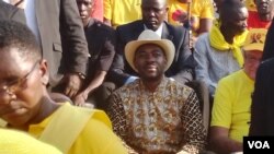 CCC leader sitting with the "masses" at Nyamhunga Stadium in Kariba on Sunday at a party rally.