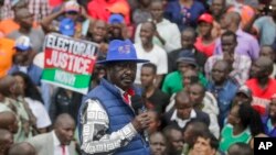 FILE - Presidential candidate Raila Odinga speaks to supporters as he arrives at his campaign headquarters after submitting a petition at the Supreme Court in Nairobi, Kenya, Aug. 22, 2022. 