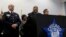 FILE - Chicago Police Superintendent Eddie Johnson, center, speaks during a news conference Sept. 21, 2016, in Chicago, Illinois. Johnson has described Monday's beating, broadcast live on Facebook, as “sickening.”