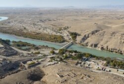 FILE - The Helmand River in Helmand province, south of Kabul, Afghanistan.