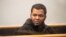 Mohamed Samsudeen, accused of carrying out an attack at an Auckland mall before being killed by law enforcement, appears in the High Court in Auckland, New Zealand, in this undated handout photo released to Reuters on Sept. 5, 2021.