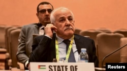 FILE - Palestinian U.N. envoy Riyad H. Mansour attends the 19th Non-Aligned Movement (NAM) Summit in the Munyonyo suburb, in Kampala, Uganda January 15, 2024.