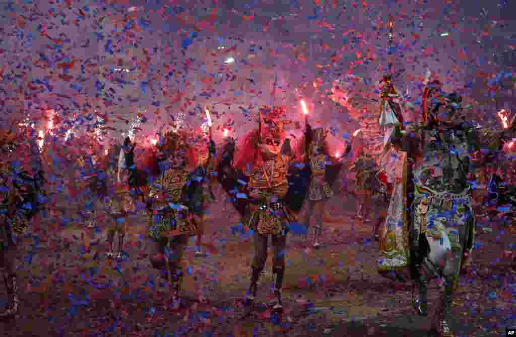 Dancers perform the traditional &quot;Diablada,&quot; or Dance of the Devils, during Carnival in Oruro, Bolivia, Feb. 26, 2022.