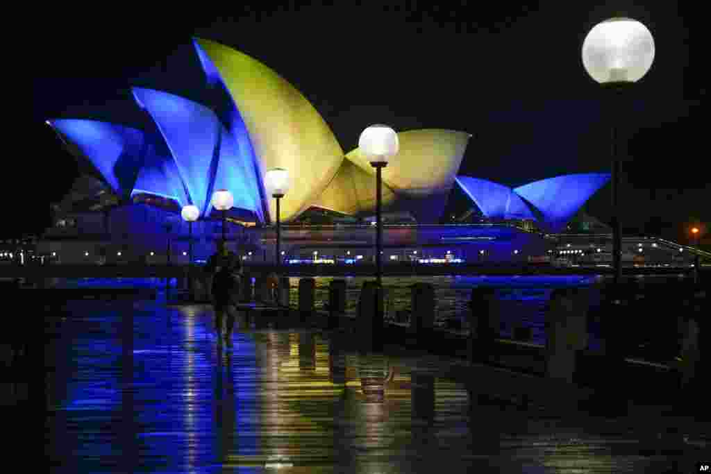 The Opera House in Sydney, Australia, is illuminated with the colors of Ukraine&#39;s national flag in solidarity with the country&#39;s people and government currently being invaded by Russia.