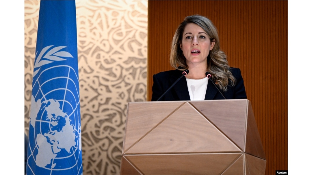 Canadian Foreign Minister Melanie Joly delivers a speech during a session of the U.N. Human Rights Council, following the Russian invasion in Ukraine, in Geneva, Switzerland, Feb. 28, 2022.