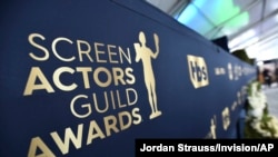 A view of the red carpet appears before the start of the 28th annual Screen Actors Guild Awards at the Barker Hangar on Sunday, Feb. 27, 2022, in Santa Monica, Calif.