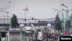 Refugiados a entrarem na Polónia