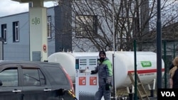 At two highway gas stations opposite each other near Khmelnytsky, a town leading to western Ukraine, the forecourts were stuffed with cars, their drivers trying to refuel.