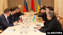 Russian and Ukrainian officials take part in the talks in the Gomel region, Belarus Feb. 28, 2022. 
