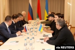 Russian and Ukrainian officials take part in the talks in the Gomel region, Belarus, Feb. 28, 2022.