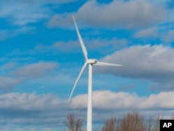 A land-based windmill helps power a sewage treatment plant in Atlantic City, N.J., Feb. 18, 2022.