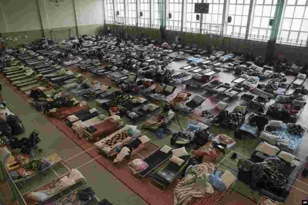 Hundreds of beds are placed inside a sports hall to accommodate Ukrainian refugees fleeing Russian invasion at the border crossing town of Medyka, Poland, March 1, 2022.