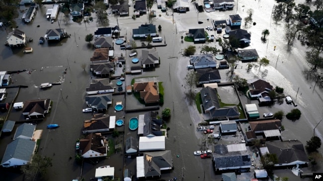 Homes are flooded in the aftermath of Hurricane Ida, Monday, Aug. 30, 2021, in Jean Lafitte, Louisiana. (AP Photo/David J. Phillip, File)