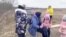 Ukrainian Mothers Hug and Cry as Children Handed Over at Border 