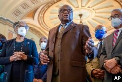 FILE - House Majority Whip Jim Clyburn, D-S.C., speaks in front of the Senate chamber at the Capitol in Washington, Jan. 19, 2022.