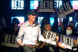 Texas Democrat gubernatorial candidate Beto O'Rourke walks onto the stage during a primary election night gathering in Fort Worth, Texas, March 1, 2022.