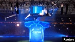 FILE PHOTO: A giant GAZPROM jersey is seen before the soccer match between Schalke 04 and Zenit St. Petersburg in Gelsenkirchen in 2007. 