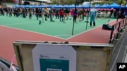 A QR code is seen at a temporary testing center for COVID-19 in Hong Kong, Feb. 24, 2022. Hong Kong started requiring proof of vaccination on Thursday to enter public places.