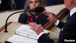 US President Joe Biden speaks about Russia's invasion of Ukraine as he delivers his State of the Union address to a joint session of the U.S. Congress in the House of Representatives Chamber at the Capitol in Washington, March 1, 2022.